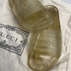 Gucci transparent slides worn